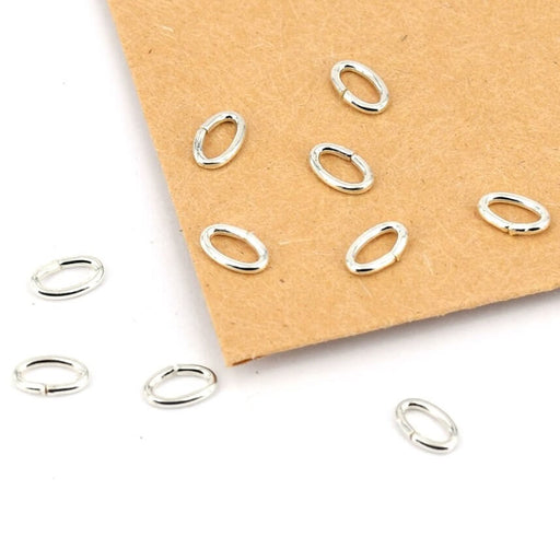 Kaufen Sie Perlen in Deutschland Sprungring oval Sterlingsilber - 5x3x0.7mm (10)