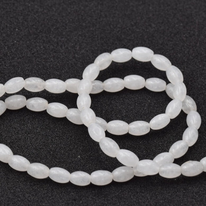 Weiße Jade-Reis-Ovalperle 6 x 4 mm – Loch: 0.8 mm (1 Strang – 39 cm)