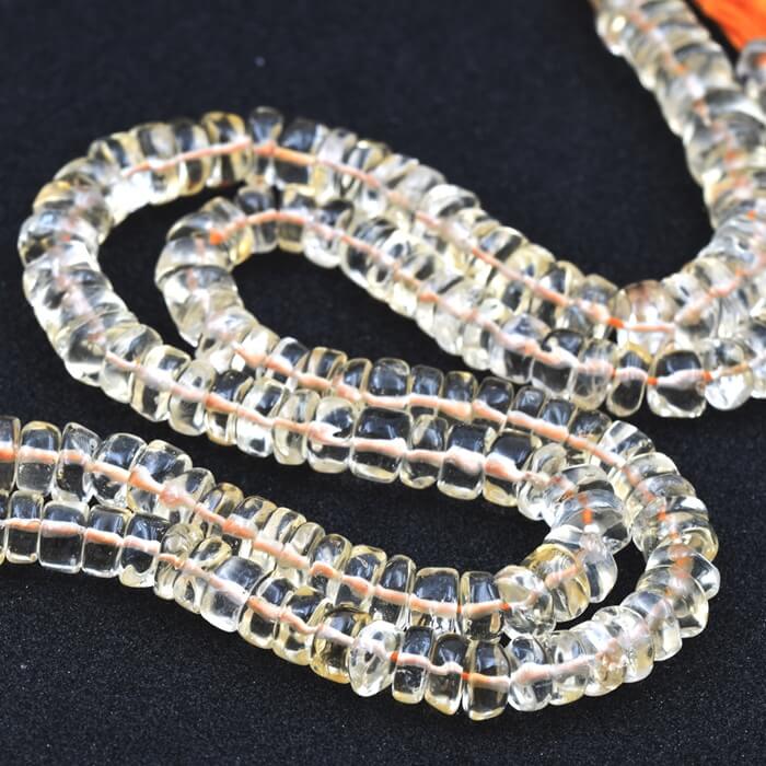 Citrine heishi roundel Perlen 7x2-4mm (1 Strang - 34cm)