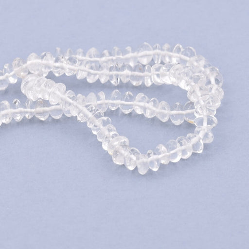 Kaufen Sie Perlen in Deutschland Quarzkristall-Knopfperle 5–6 x 3–4 mm – Loch: 0.5 mm (1 Strang – 33 cm)