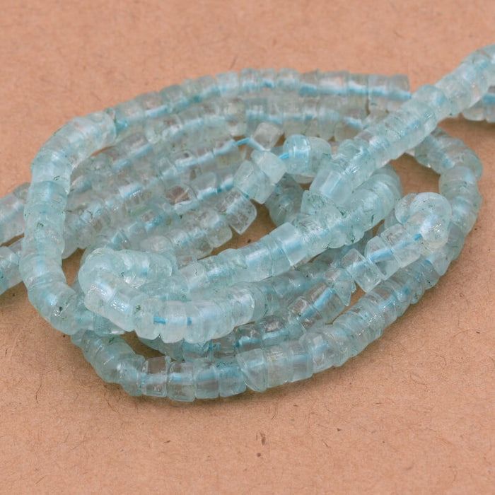 Heishi Rondelle Perle Aquamarin 5x2-3mm - Loch: 0,5mm (1 Strang-32cm)