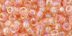 cc169 - Toho rocailles perlen 6/0 trans-rainbow rosaline (10g)
