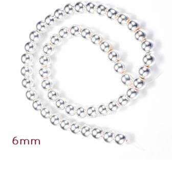 Kaufen Sie Perlen in Deutschland Rekonstituierte Hämatitperlen, versilbert, 6mm - 1 strang - 64 Perlen (1 strang)
