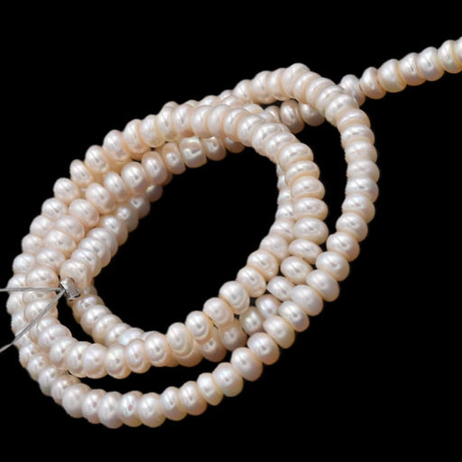Süßwasserperlen Rondell-Form Farbe: Cremeweiß 4 x 2 mm – Loch: 0.5 mm (1 Strang)