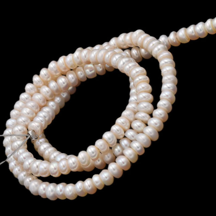 Süßwasserperlen Rondell-Form Farbe: Cremeweiß 4 x 2 mm – Loch: 0.5 mm (1 Strang)