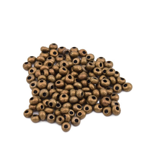 cc225 - Toho Magatama Perlen 3mm Antique Bronze Gold (10g)