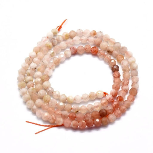 Kaufen Sie Perlen in Deutschland Natürliche Erdbeerquarz-Facettenperle 3 mm – Loch: 0,5 mm (1 Strang – 35 cm)