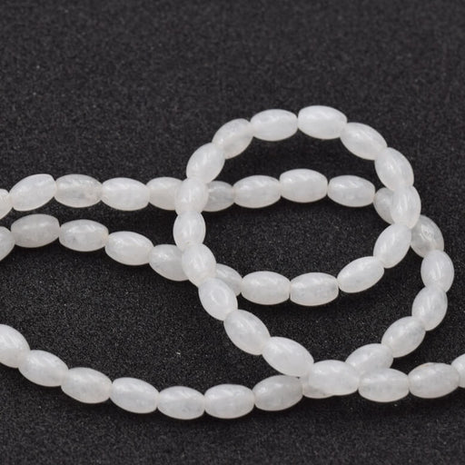 Weiße Jade-Reis-Ovalperle 6 x 4 mm – Loch: 0.8 mm (1 Strang – 39 cm)