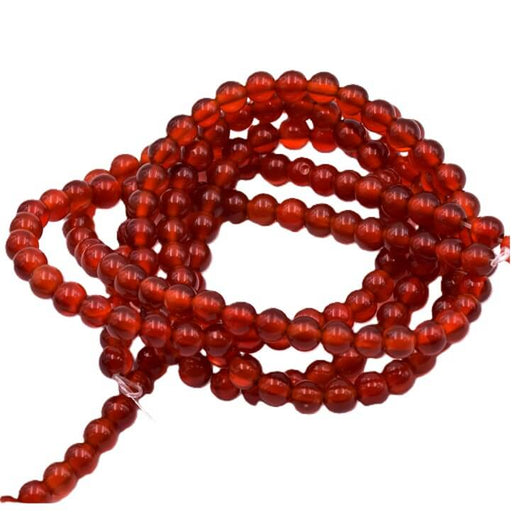 Kaufen Sie Perlen in Deutschland Runde Karneol-Perle -natürlich – 4 mm – 0.8 mm Bohrung (1 Strang à 38 cm).