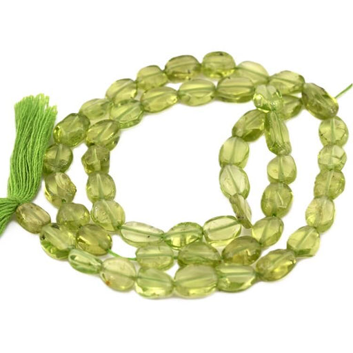 Peridot flache ovale Pastille Perle 6-11x4-6mm (1 Strang-32cm)