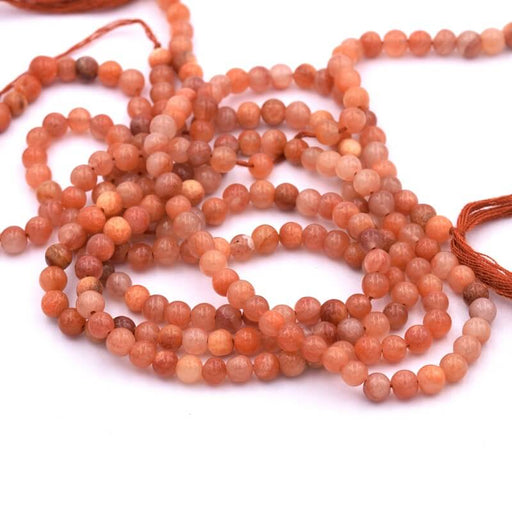 Kaufen Sie Perlen in Deutschland Runde Perle Orange Achat 3,5–4,5 mm – Loch 0,6 mm (1 Strang – 33 cm)