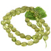 Peridot flache ovale Pastille Perle 7-10x6-7mm (1 Strang-33cm)
