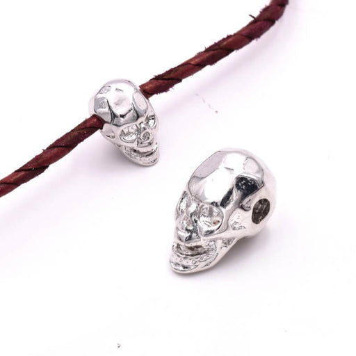 Kaufen Sie Perlen in Deutschland Totenkopfperle, facettiert, Platin-Messing, 8 mm – Loch 2 mm, horizontal (1)