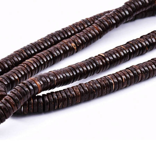 Kaufen Sie Perlen in Deutschland Heishi Disc Perlen in Kokos natur 7x2mm, Loch: 1mm, 31cm (1 Strang)