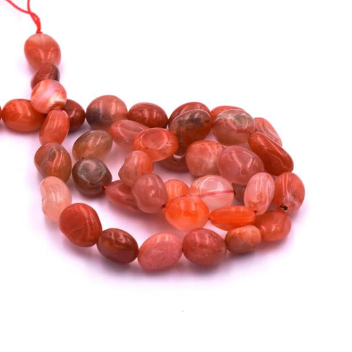 Kaufen Sie Perlen in Deutschland Natürliche Nuggetperle aus rotem Achat 8-13x7-8mm (1 Strang)