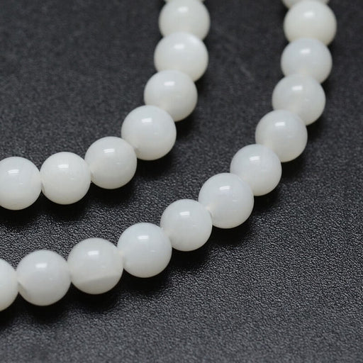 Kaufen Sie Perlen in Deutschland Runde Mondsteinperlen 4 mm - Loch: 0,8 mm - Strang 39 cm (1 Strang)