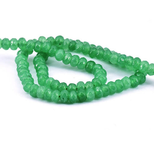 Kaufen Sie Perlen in Deutschland Facettierte runde Perle in Jadegrün – 6x4 mm – Loch: 1mm (1 Strang – 34 cm)