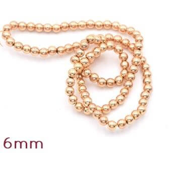 Kaufen Sie Perlen in Deutschland Rekonstituierte Hämatitperlen, hellvergoldet, 6mm - 1 strang - 64 Perlen (1 strang)