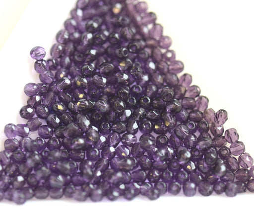 Kaufen Sie Perlen in Deutschland Glasschliffperlen tanzanite 2mm (50)