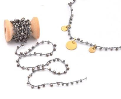 Kaufen Sie Perlen in Deutschland Baumwollschnur dune mit rocailles-perlen GRAU (90cm)
